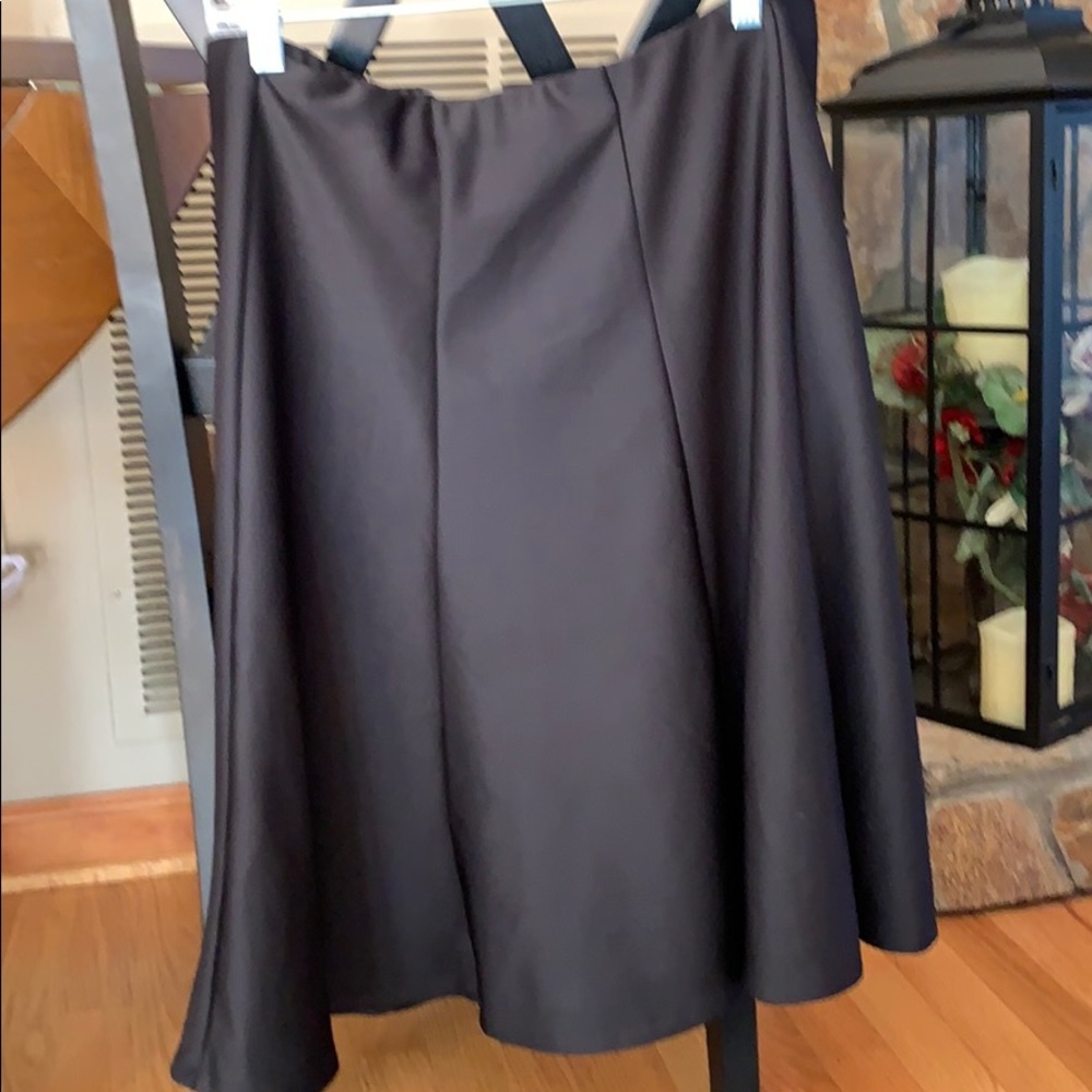 Black silky knee-length skirt